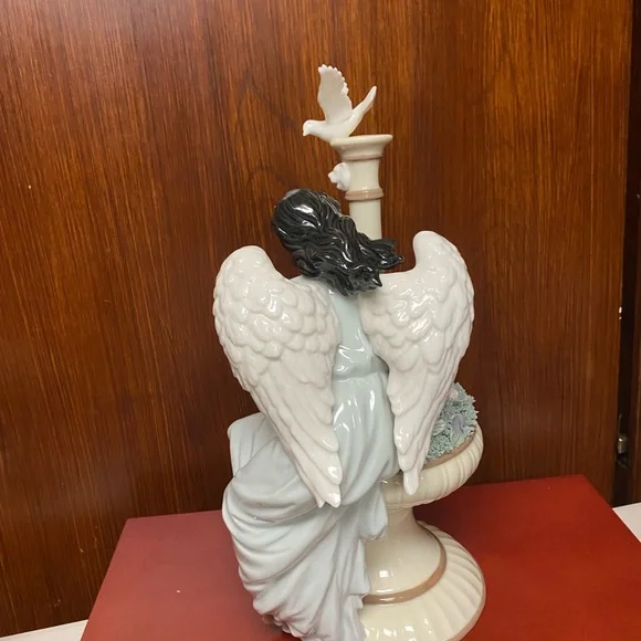 Grandeur Noel Porcelain Angel sculpture in fountain
